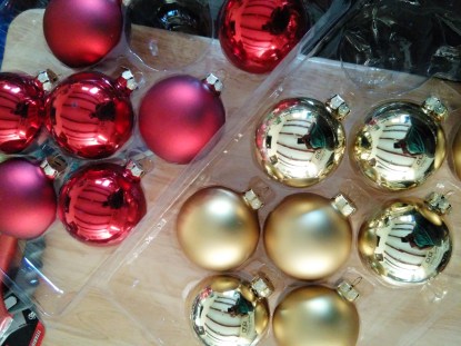 These are about $10 for 18 ornaments. Plain but very effective fillers. 